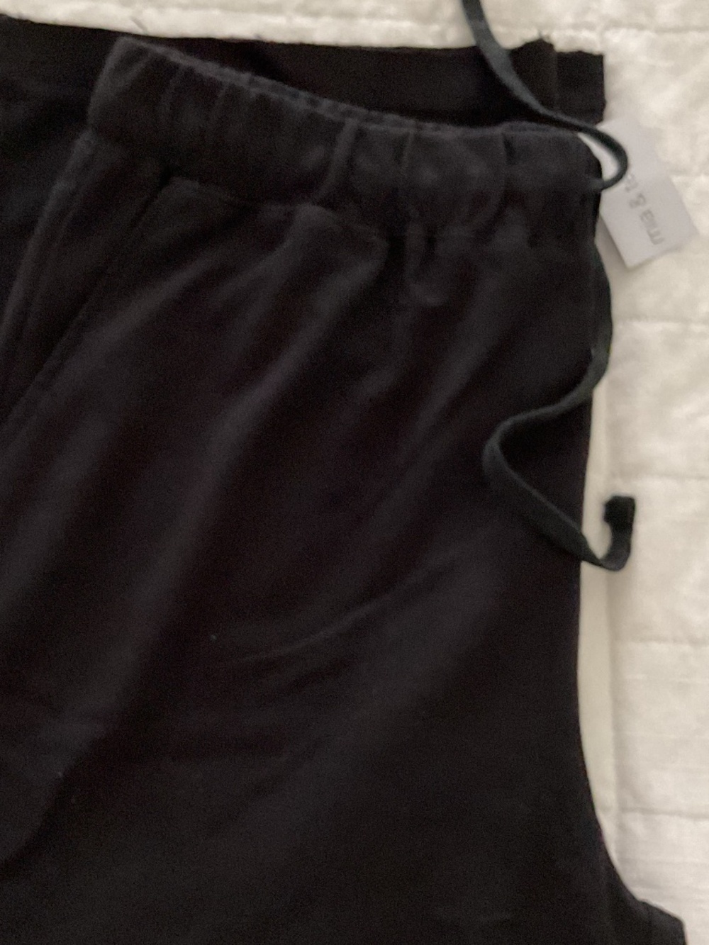 Mai and Tess black raw edge sweat pants